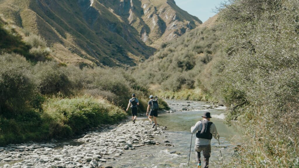 Ben Wallbank remote adventure filming in a river